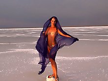 Beautiful sunset scenery by a shawl on a salt lake