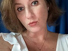 Charming older girlfriend is fingering herself