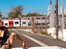 Awesome-looking older housewife is posing at home
